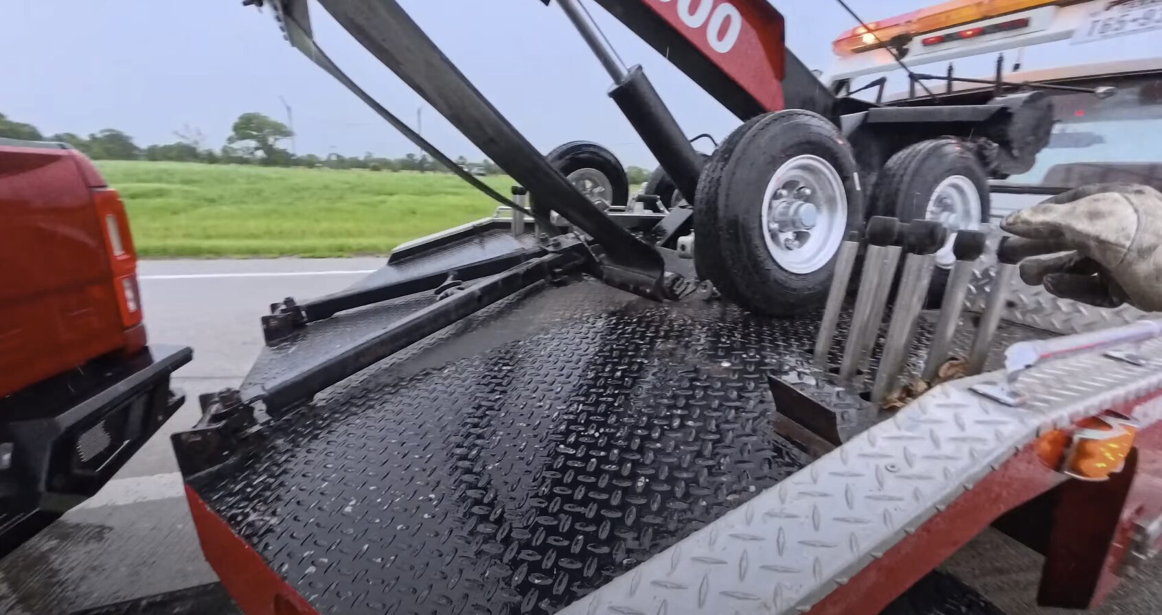 Heavy-duty tow truck on roadway showing professional equipment