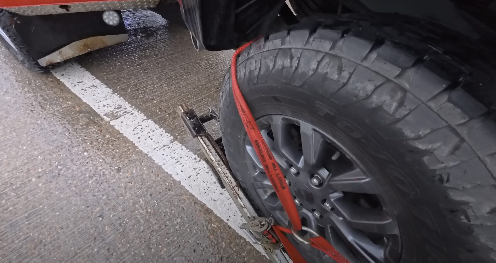 Professional vehicle securing equipment being used for accident recovery